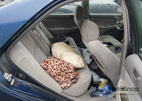 2002 Toyota Camry Le z USA, uszkodzony, nr VIN 4T1BE32K92U578261